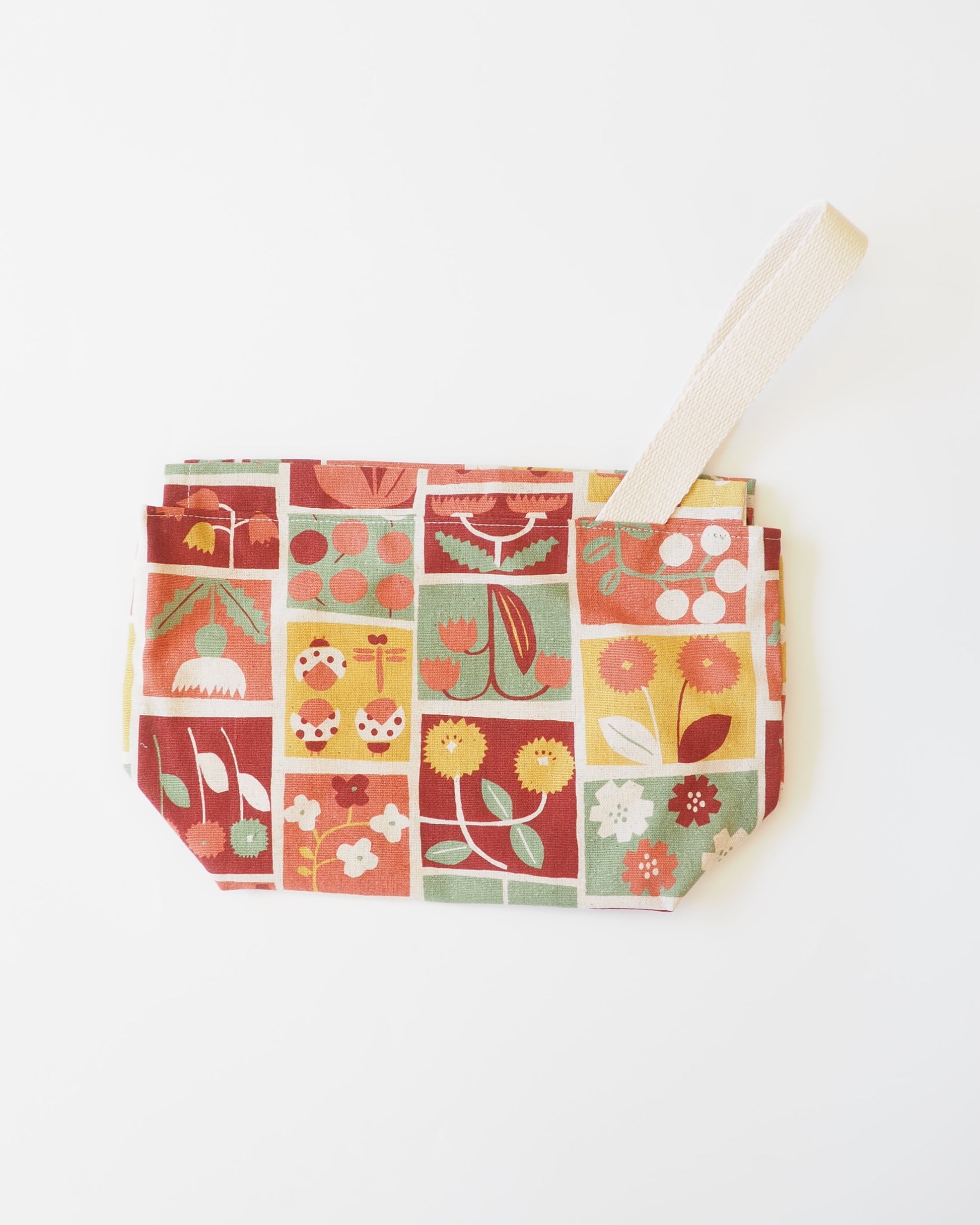 Fabric pouch with floral pattern on a white background