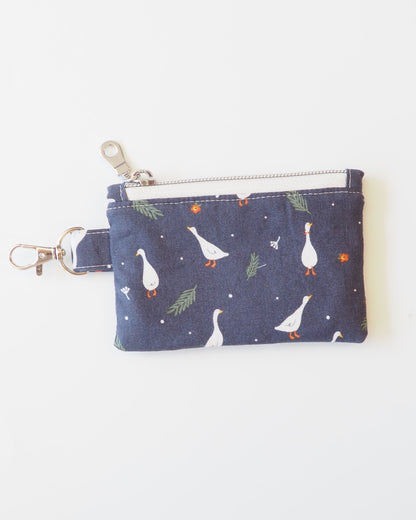 Small pouch with a bird pattern on a white background