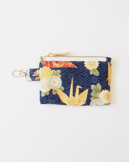 Floral patterned pouch on a white background