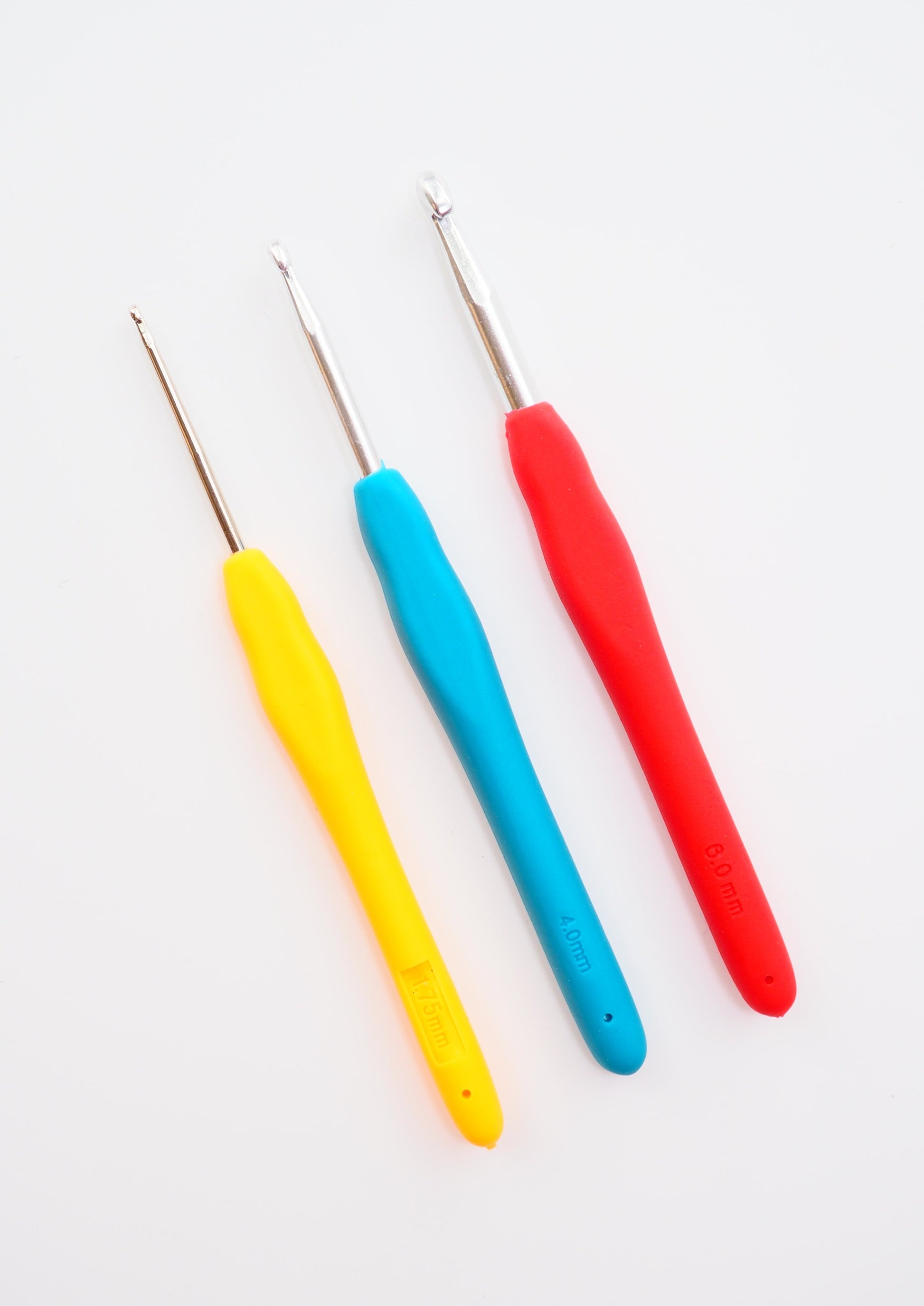 image of three cushioned crochet hooks in sized 1.75mm, 4mm and 5mm